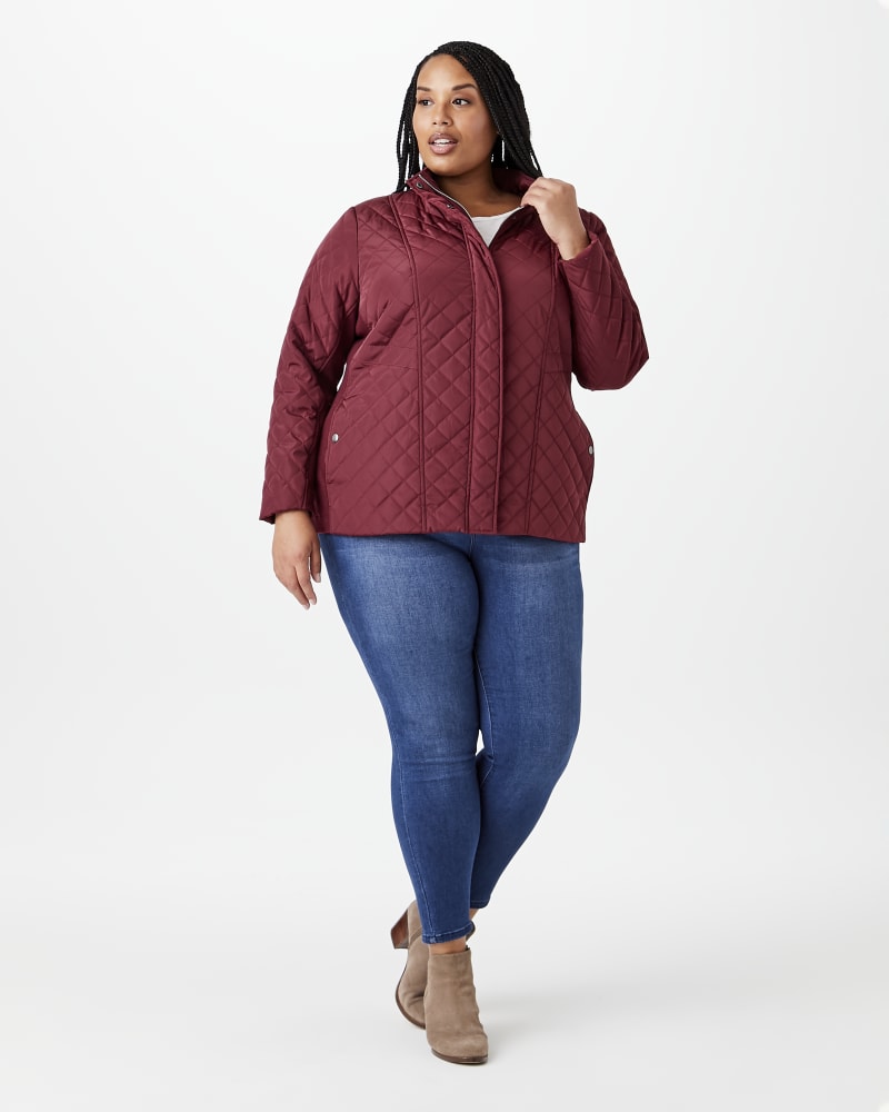 Plus size model with hourglass body shape wearing Abelia Quilted Jacket by Molly&Isadora | Dia&Co | dia_product_style_image_id:144413